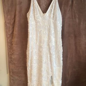 White dress with sequins, new never worn, size XL but fits small.